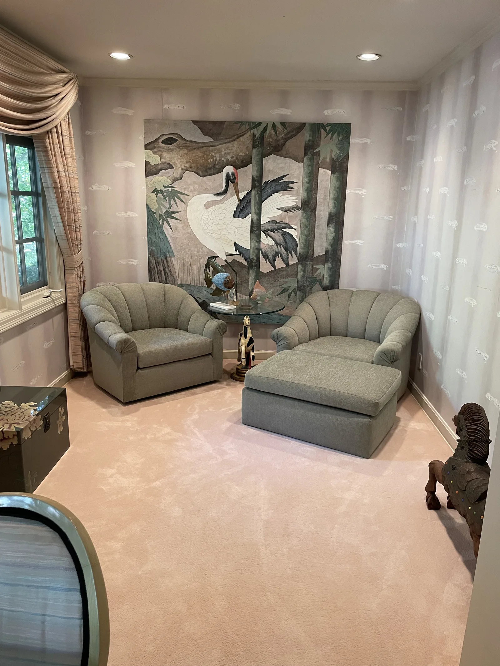 The room before work began, furnished with the original wallpaper on the walls