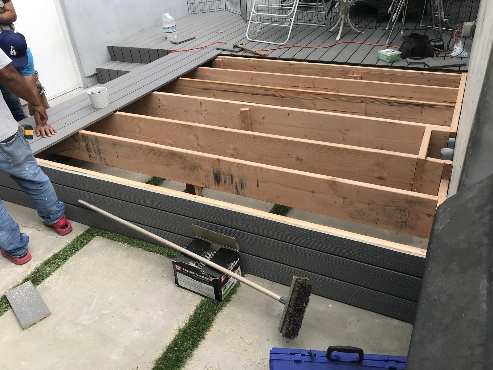 New framing for a deck extension built off the side of the new decking