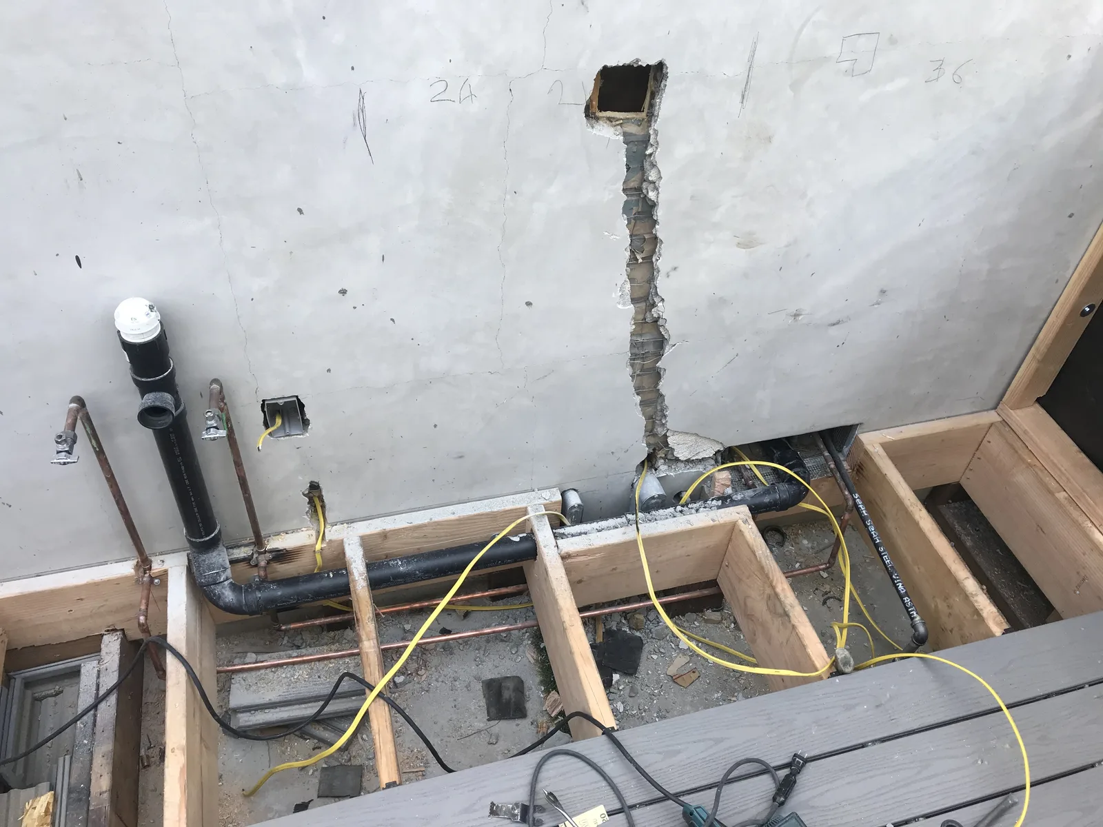 Gas and plumbing lines run into new extension framing