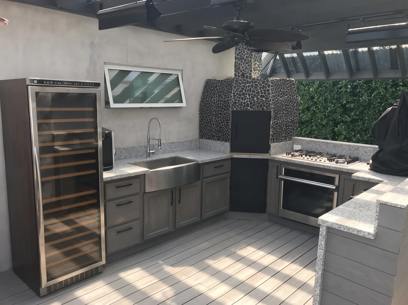 The finished outdoor kitchen with the custom welded oven doors in place