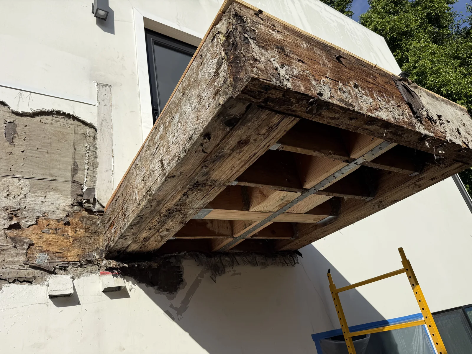 New wood framing installed to rebuild the balcony structure