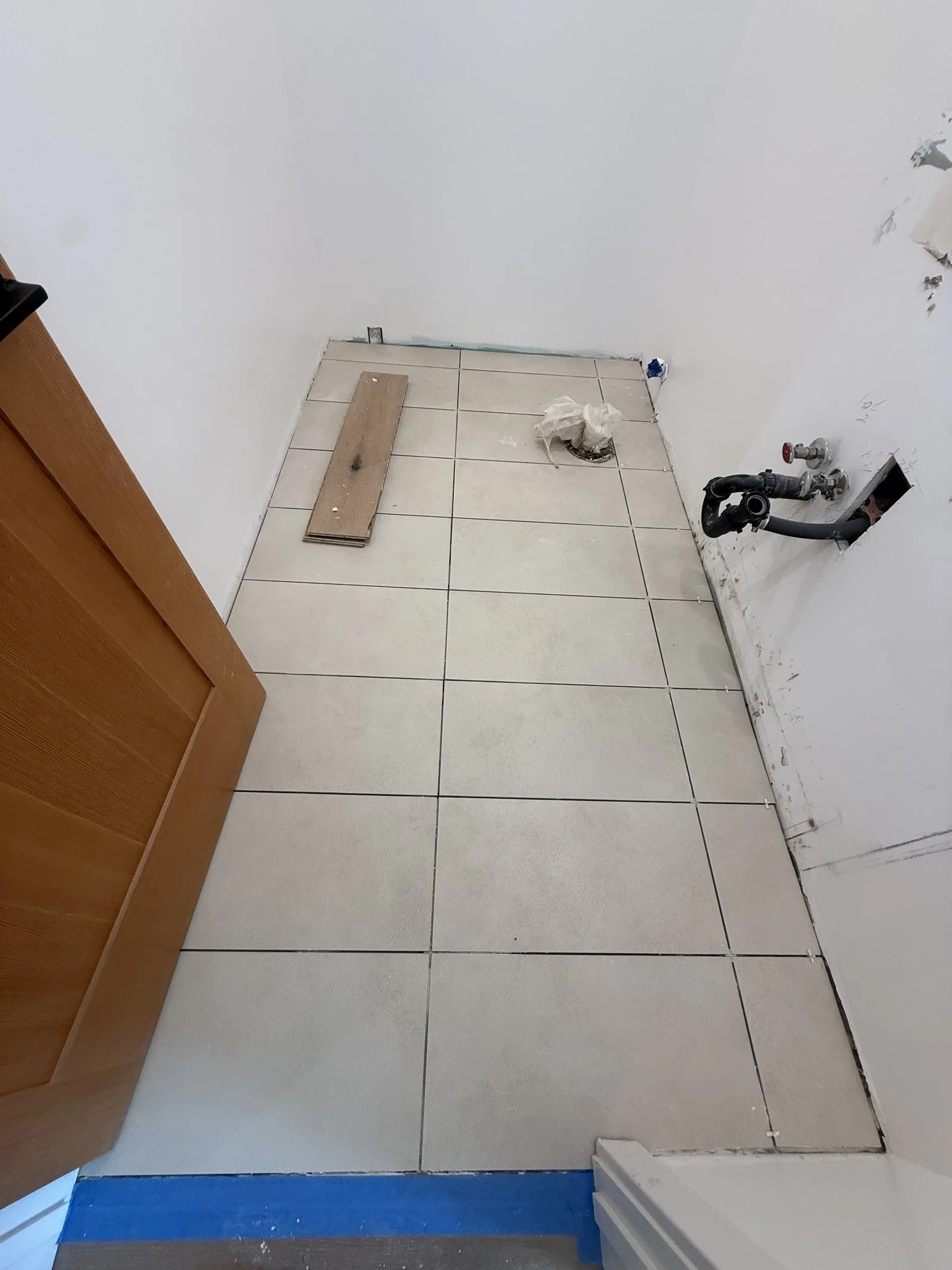 A finished interior room with new tile flooring complete