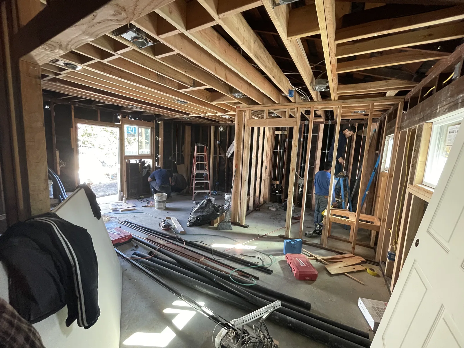 New ceiling and interior wall framing inside a garage under conversion