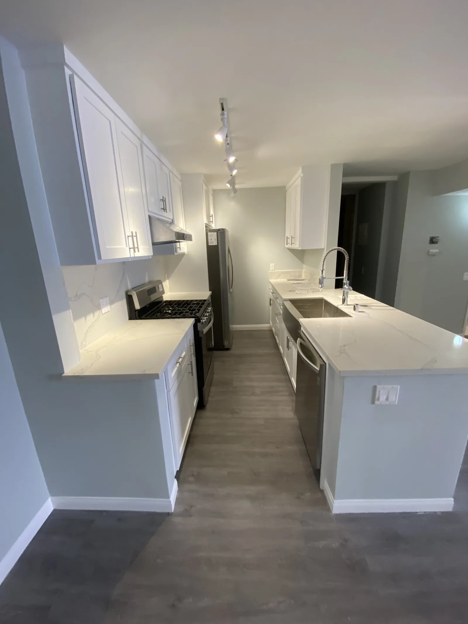 The finished kitchen range and refrigerator from another angle